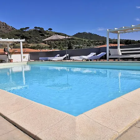 Attico Con Sauna E Piscina A Porto Azzurro